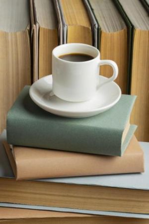 books-arrangement-with-cup-cofee.jpg